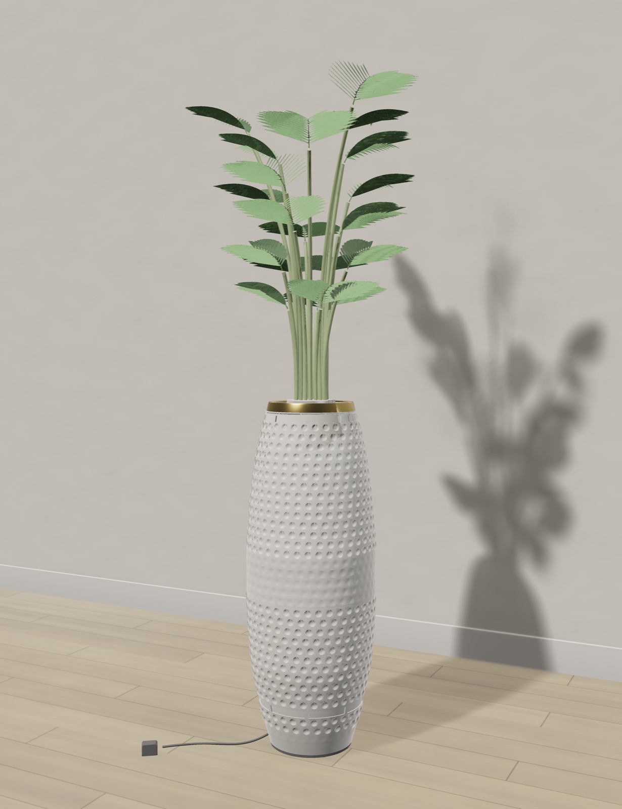Purispira in white: a tall hammered vase with a brass rim and a palm